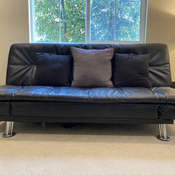 black futon and chaise lounge