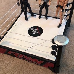 Wrestling Ring and Three Wrestling Figures