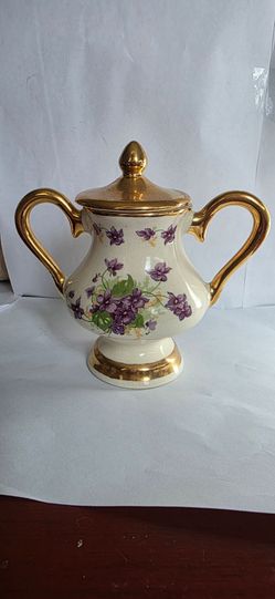 Antique reproduction 22kt gold violet purple flowers bone china creamer. Teapot and sugar sold separately