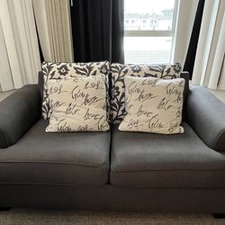 Love seat with cushions included