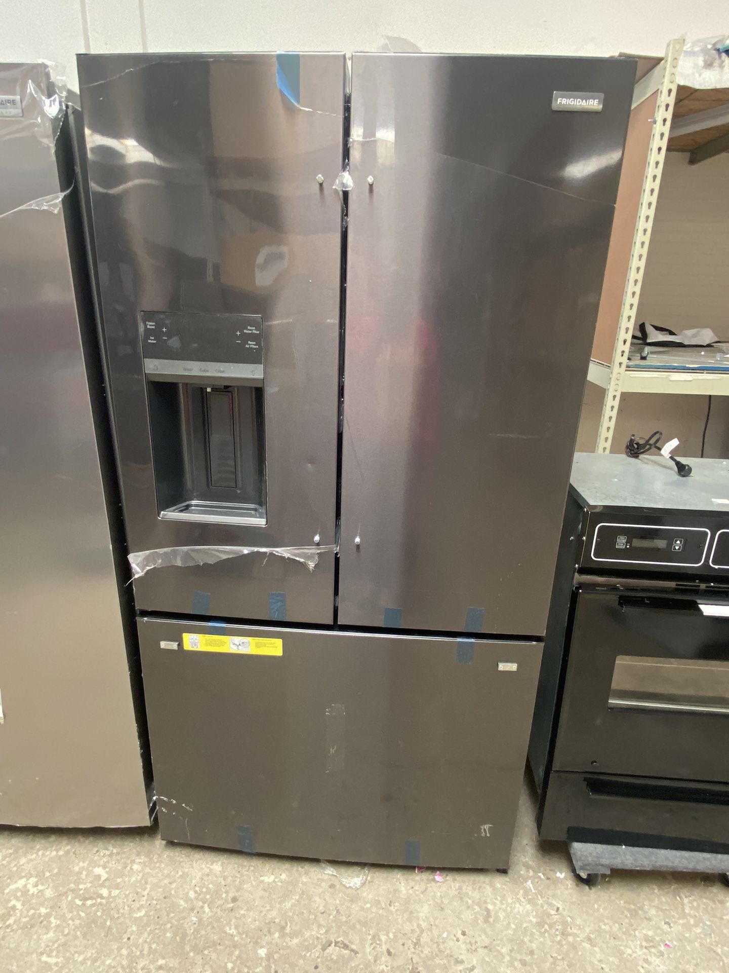 NEW BLACK STAINLESS STEEL FRIGIDAIRE REFRIGERATOR 