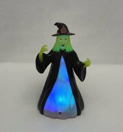 Vintage Halloween witch toy multicolor light-up laughs cackles motion sensor