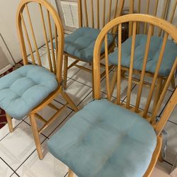 4 Solid wood chairs with cushions 