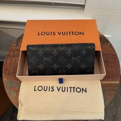 Authentic Louis Vuitton, NEW Brazzaville Wallet M1697