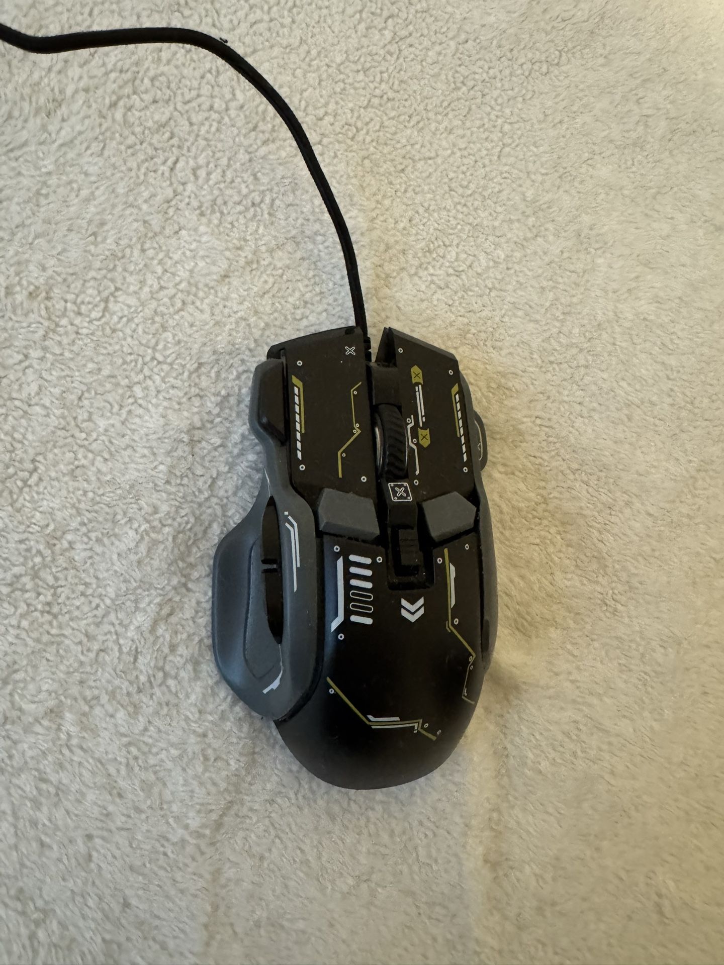 Gaming mouse with multiple side buttons