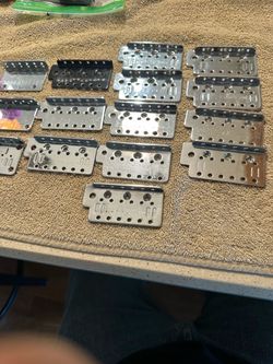 Electric guitar bridge tops