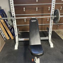 Bench press w Olympic Bar & Weight (two 45s)