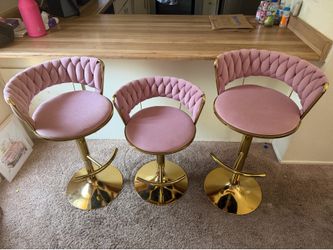 3 pink barstools