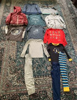 size 6–7. Mix of John Lewis, Athletic Works and other pieces. Includes fall/winter clothes and a puffer jacket. Good pre-owned condition. Please see p