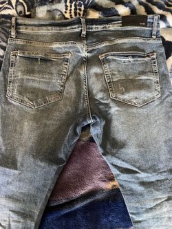 AMIRI Distressed Jean