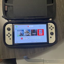 Nintendo Switch OLED w/ Case & 2 Games