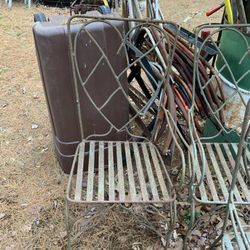 7 Wrought iron Heart backed Arm Chairs