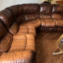 Leather sectional couch w/ end-recliner seats