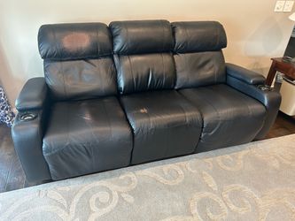 (2) Black Faux Leather Power Reclining Sofas with Drop-Down Console