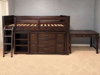 Brown wood four piece twin loft bed