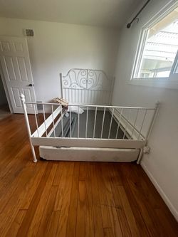 White metal bed frame