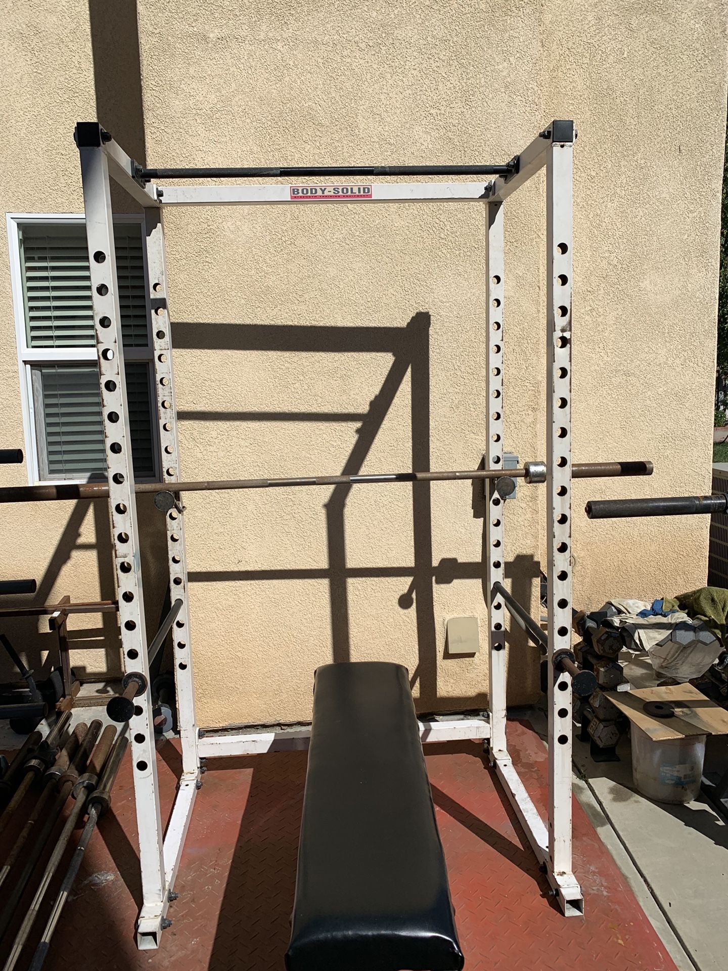 Body solid squat rack, weights plates, bar and clips