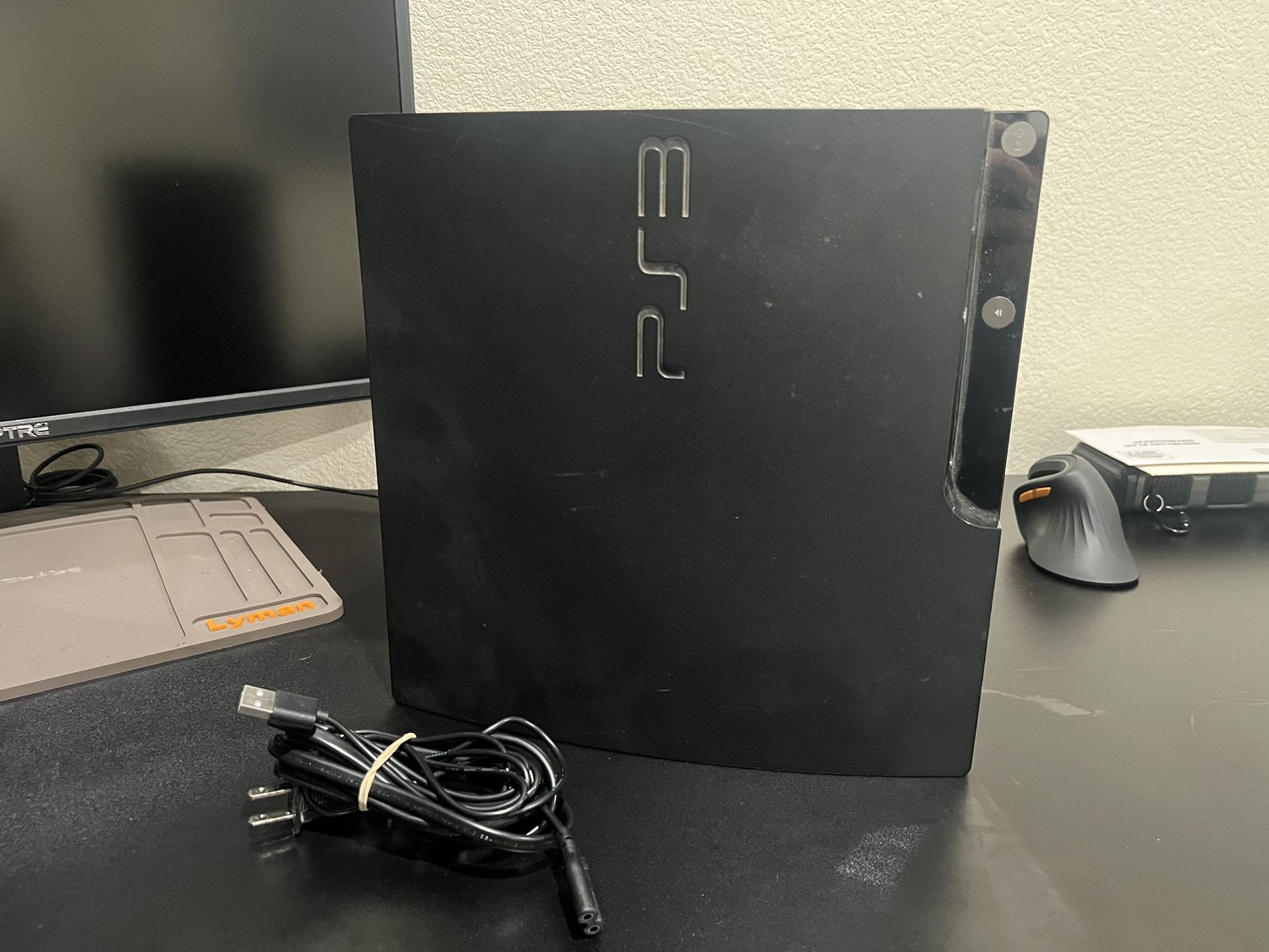 PS3 Slim With Games. 