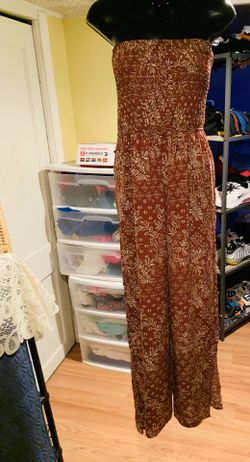 Wore once in great condition romper size medium