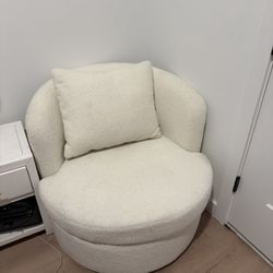 White Boucle Swivel Chair With Pillow