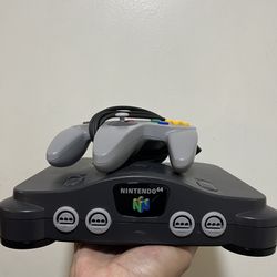 Nintendo 64 Console With One Controller, Red Expansion Pack, Power Supply And Video Cable 