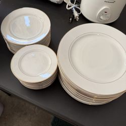 12 plates, saucers, and small plates