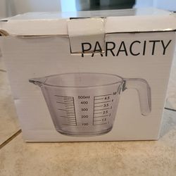Brand New Measuring Cup