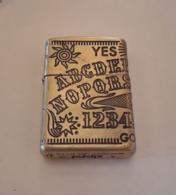 Zippo Ouija Board Antique works great
