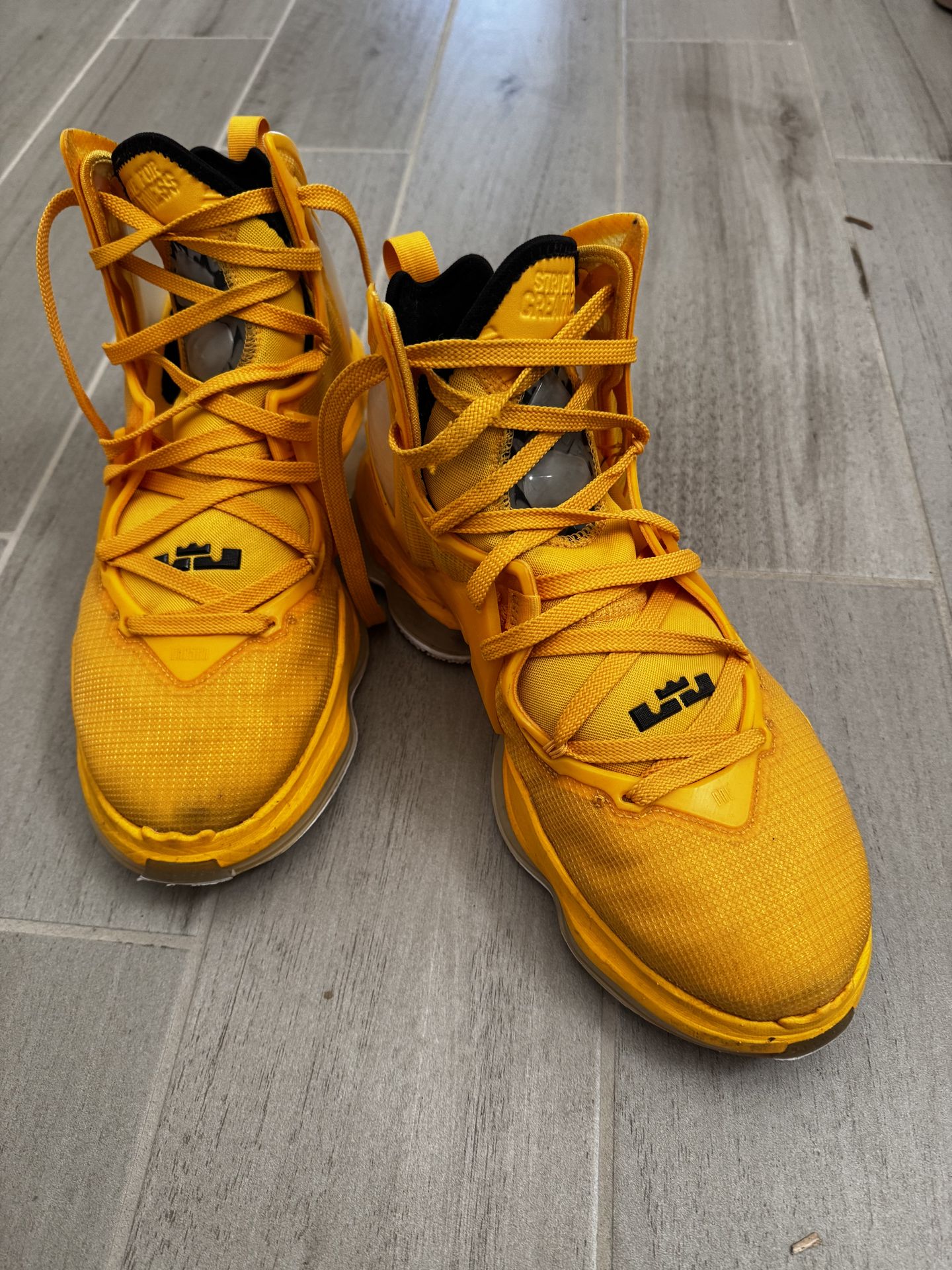 Nike LeBron 19 "Hard Hat" in the University Gold/Black 11.5