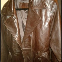 Authentic Leather jacket $499 size M wore once too big