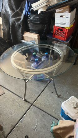 Glass table 48” x 29 1/2” tall
