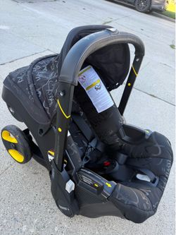 Limited Edition Doona Car Seat + Stroller with Base & Accessories(expiration 2029)