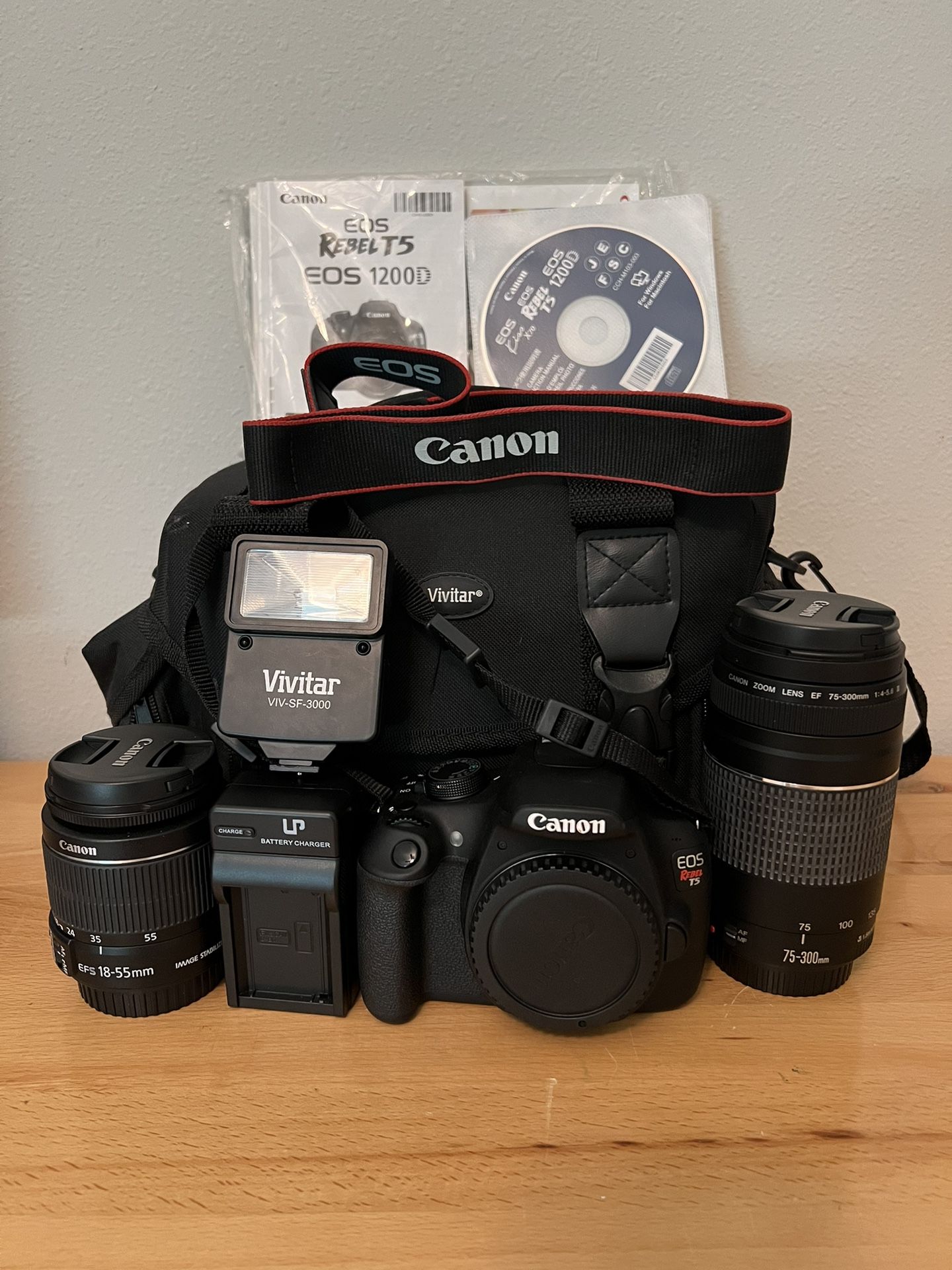 Canon EOS Rebel T5 Camera With Two Lens, Camera Bag , Battery Charger And Additional External Flash