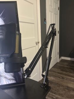 Microphone with boom arm