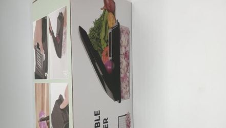 -in-1 Vegetable Chopper Slicer Dicer with Container Retail $25.00