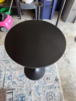 Black Pedestal High-Top Tables – Set of 4 | $200 (or $75 each)