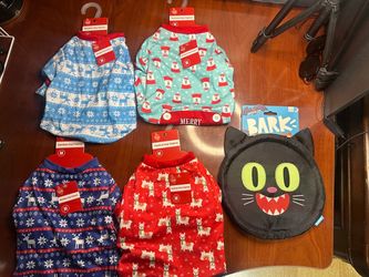 $2 each or 2 for $3 Holiday Dog Sweaters & Pajamas