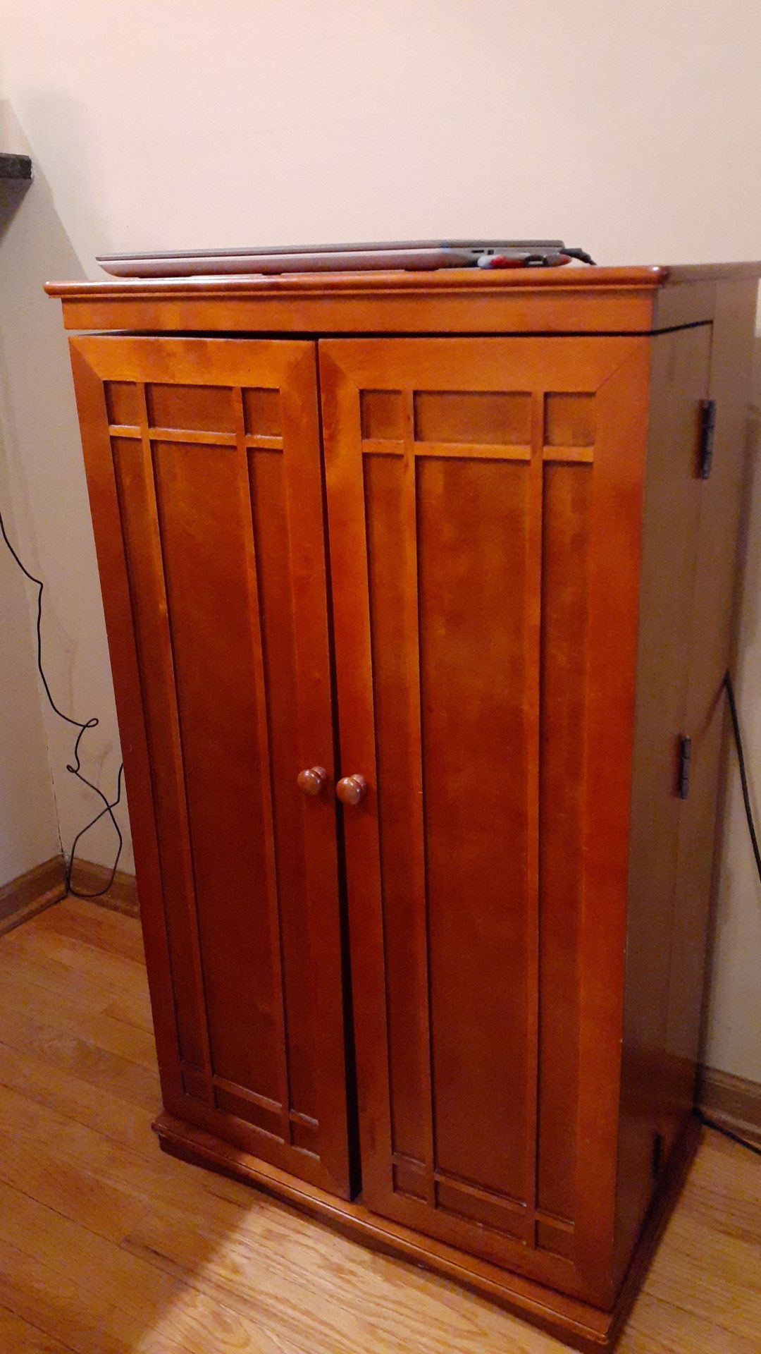 Perfect media storage cabinet with lot of storage. Cherry color.