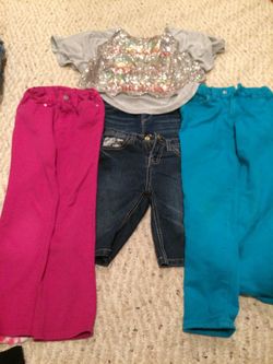Size 6 lot of clothes jeggings shirts and sparkly top