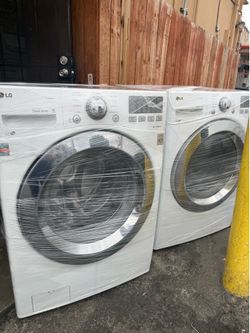 LG steam white set  front load washer and dryer