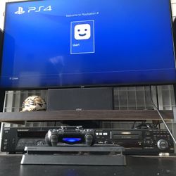 Sony PlayStation 4 Slim console + DualShock 4