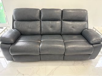 Blue recliner and sofa