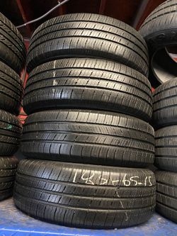 SET OF FOUR SEMI NEW TIRES 185/65/15. $160 PRICE INCLUDES PROFESSIONAL INSTALLATION AND TAX