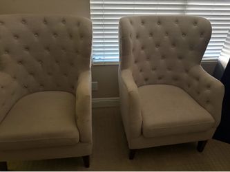 Large tufted chairs