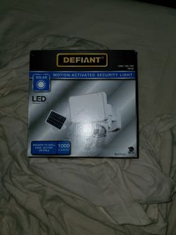 Solar motion security light