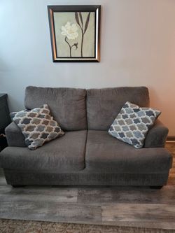 Loveseat with Pillows from Ashley Furniture Good Condition...Pick Up Only