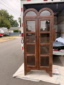 Tall Wood Display Cabinet with Arched Glass Doors