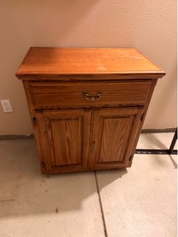 Dresser ( it has wheels to roll )