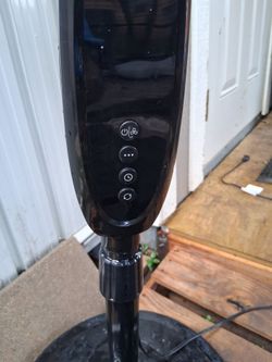 black Honeywell pedestal fan