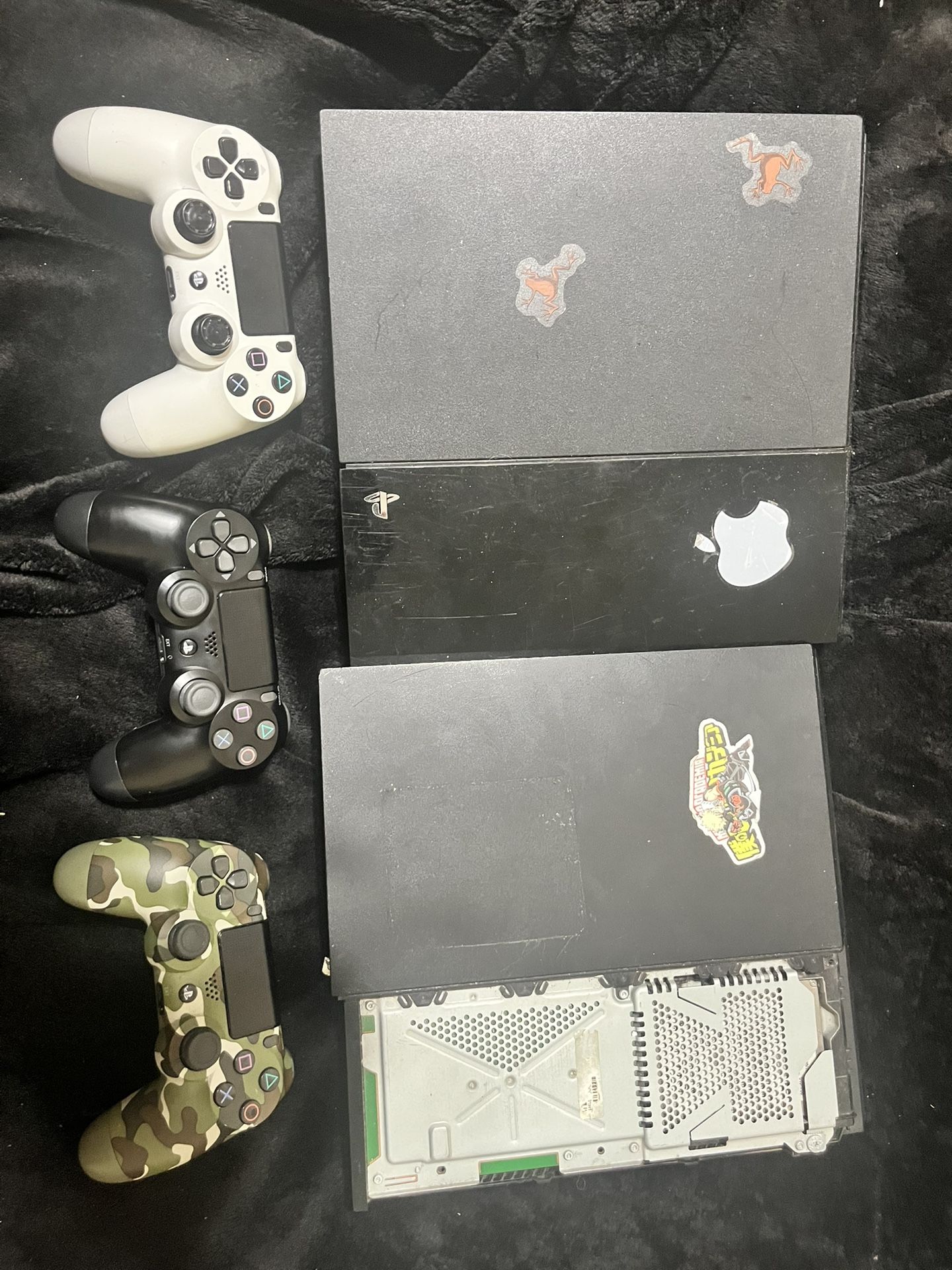 Two PlayStations Used And Three Controllers